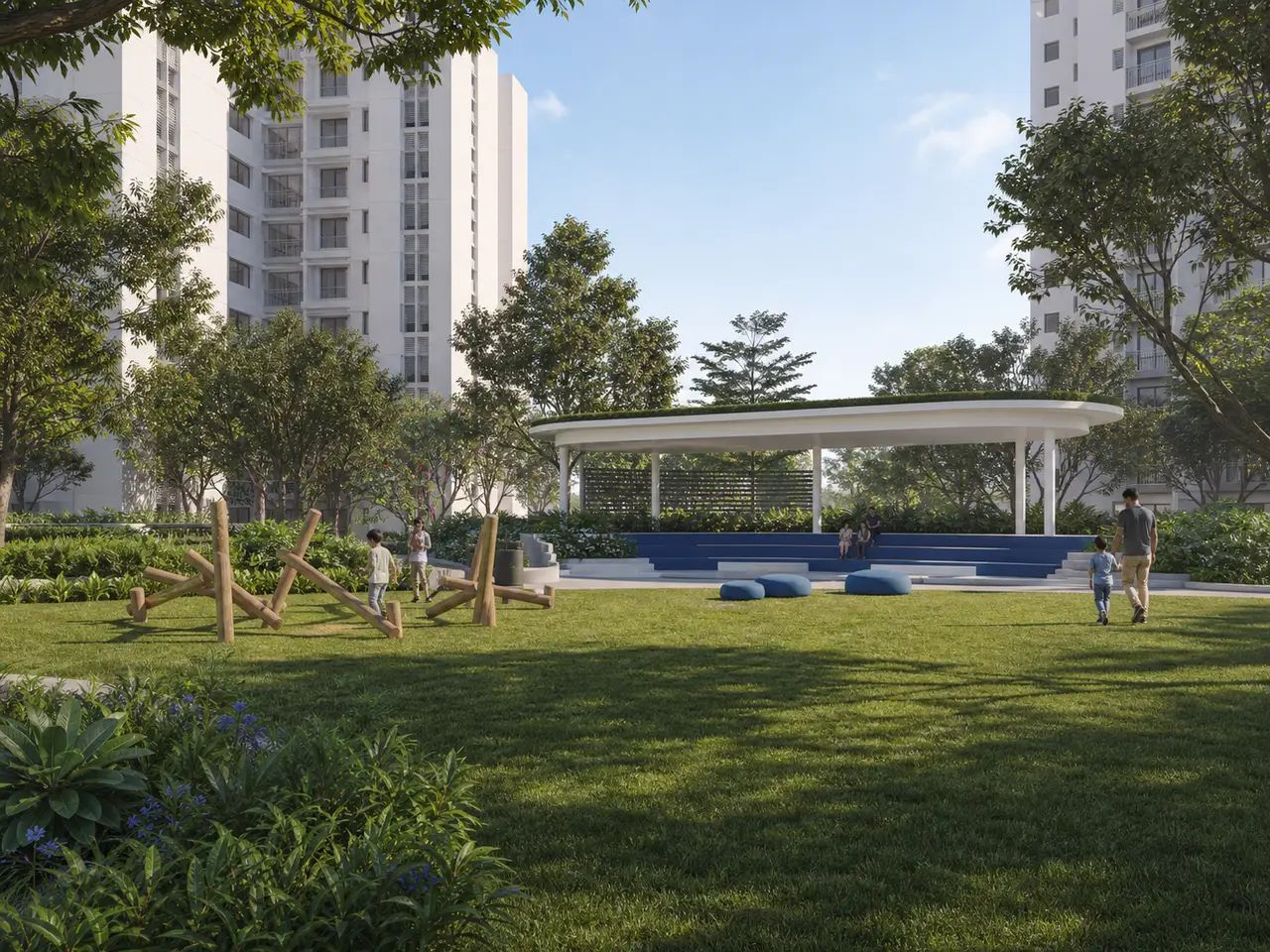 Landscaped family meadow with timber play forms and a white shade pavilion
